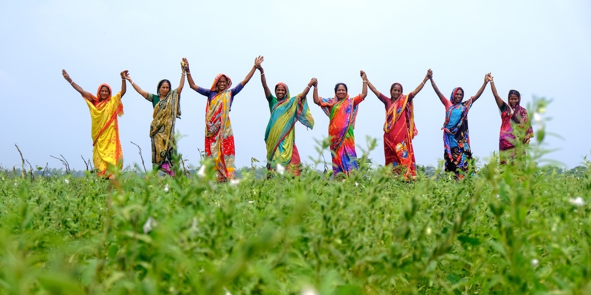 Women together holding hands