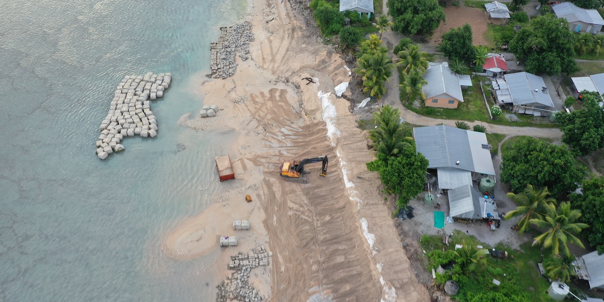 Aerial shot of coastal adaptation project building out the coastline