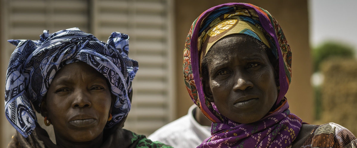 Two women looking at the camera in Mali