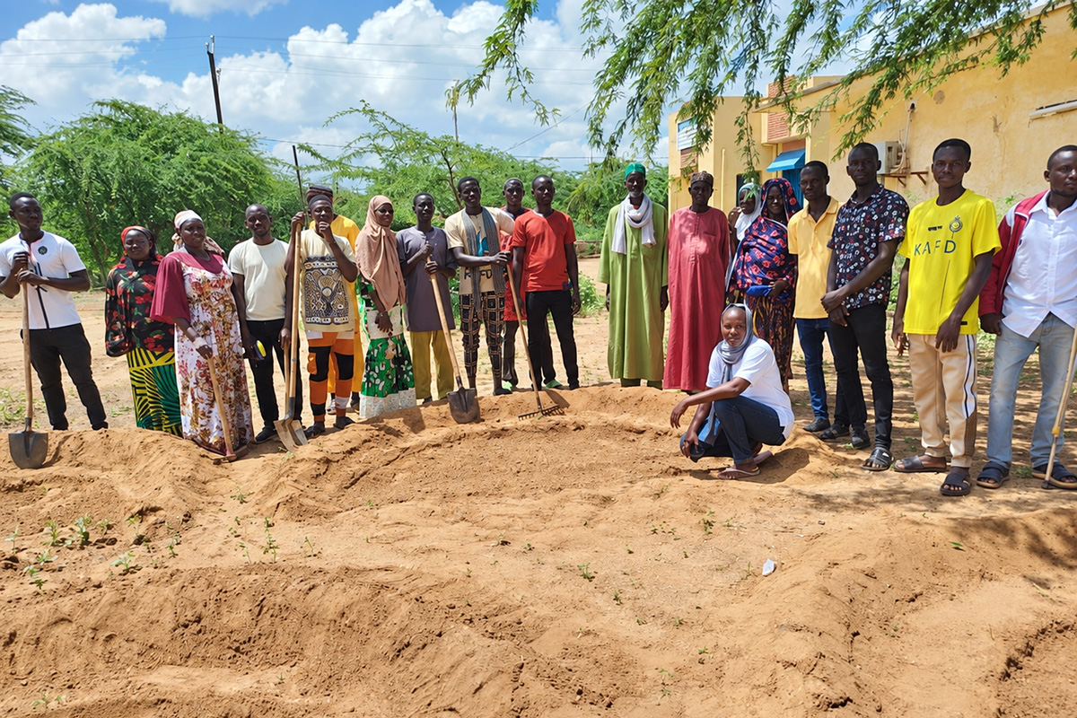 A group of farmers is trained on climate-resilient agriculture in Burkina Faso.