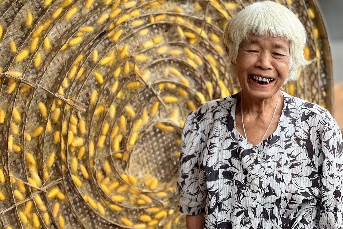 silk-farmer-with-cocoon
