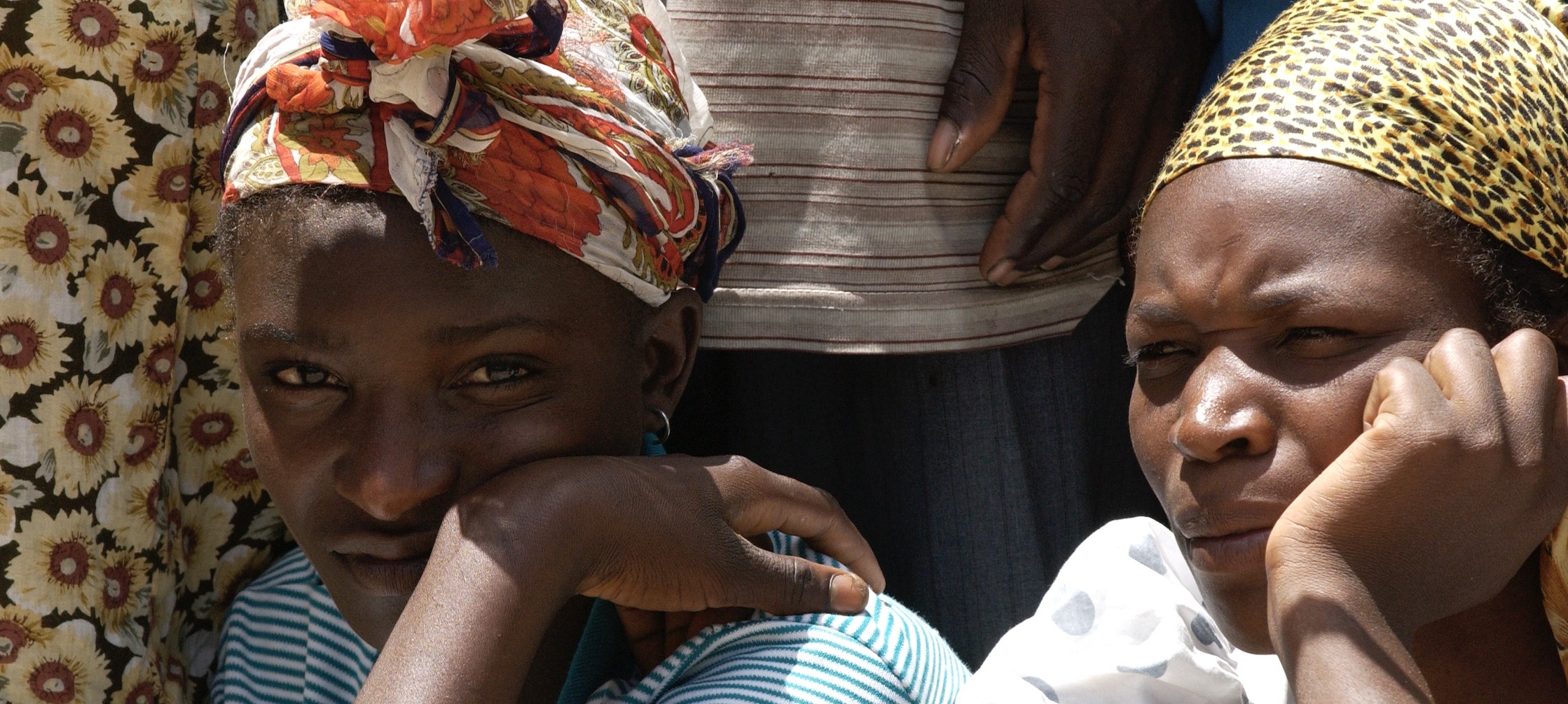 Two Haitian women sitting 