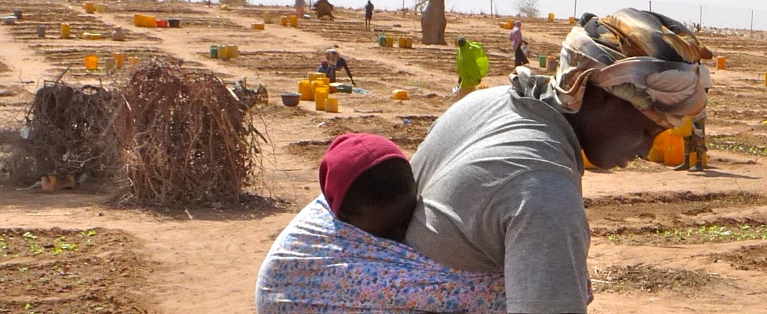 Woman and child walking in Niger 